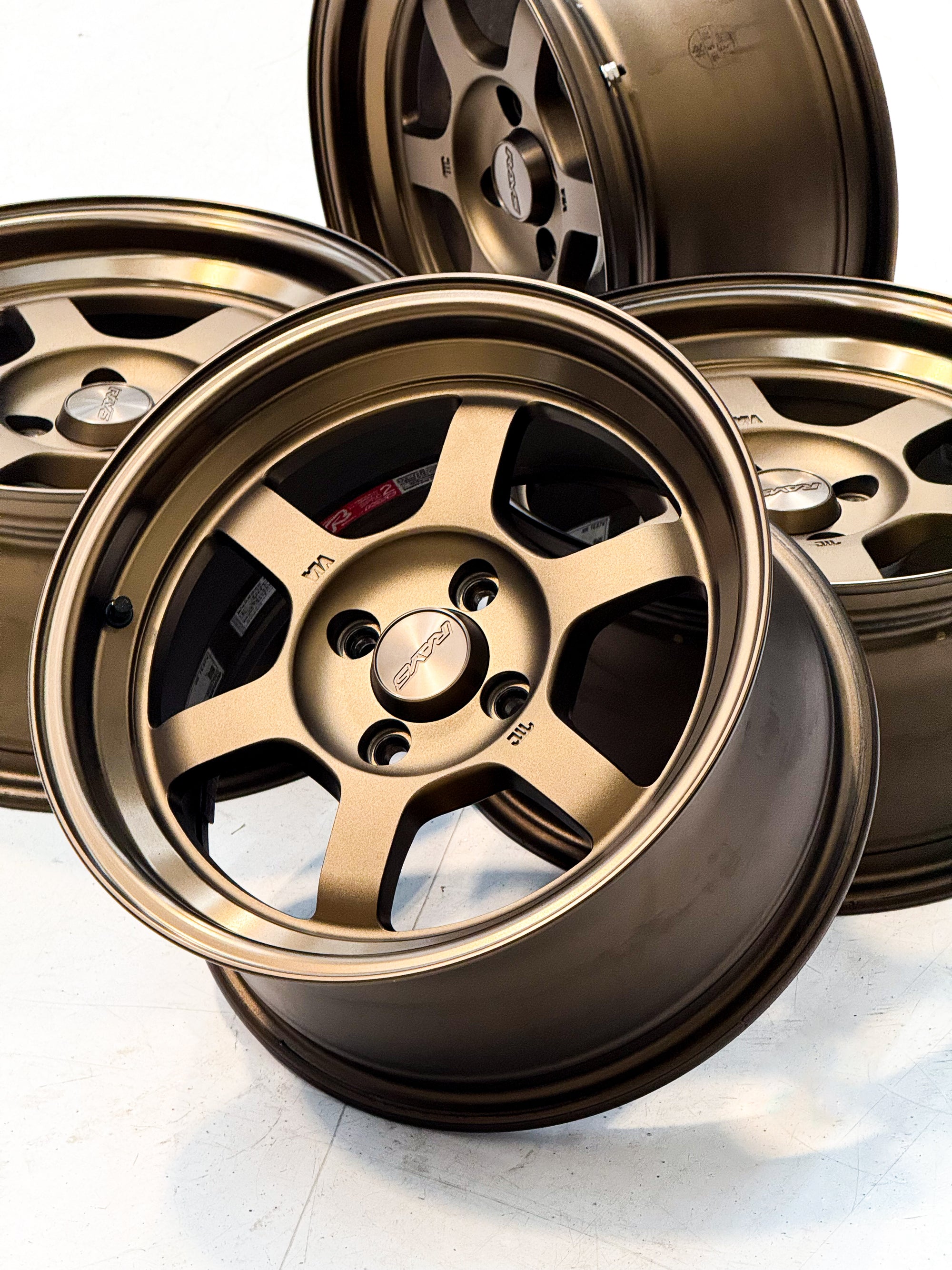 PRE-OWNED VOLK RACING TE37V 15X8 +25 4X100 BRONZE